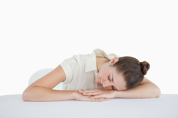 Businesswoman leaning on her desk