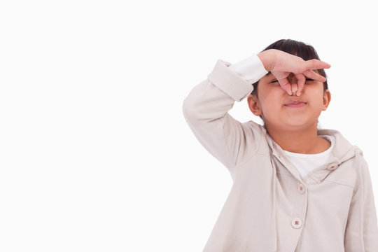 Girl Pinching Her Nose