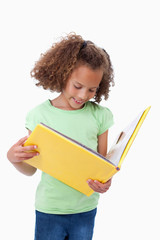 Portrait of a girl reading a fairy tale © WavebreakmediaMicro