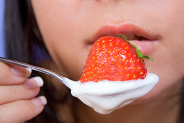 The detailed look at yogurt with strawberry