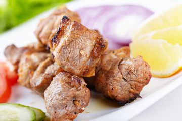 Pork shashlik with fresh vegetables