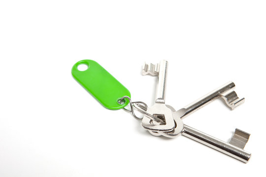 Schlüssel mit grünem Anhänger