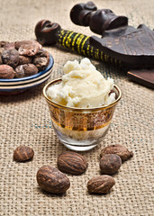 Still life of shea butter ad nuts