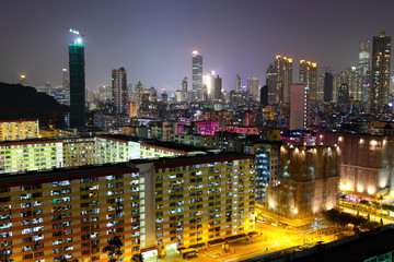Fototapeta na wymiar Hong Kong downtown with many building at night
