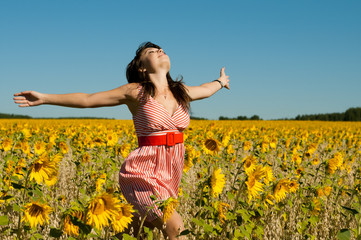 Fototapeta premium beautiful woman runs on a glade
