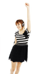 Happy teen girl listening to music