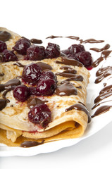 pancakes with cherry jam and chocolate icing