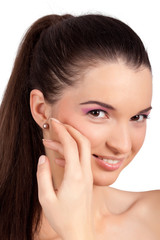 Fototapeta premium Closeup portrait of a beautiful girl smiling