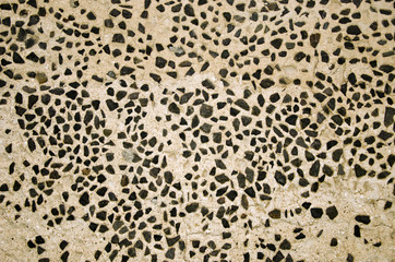 Wall decorated with small flint stones backdrop