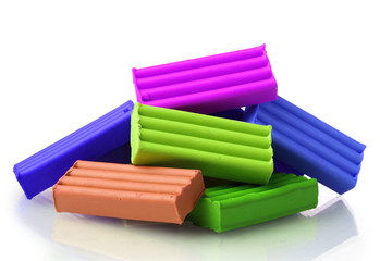 Fototapeta premium Children bright plasticine isolated on white
