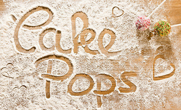 Flour Artwork With Food And Handprints Cake Pops