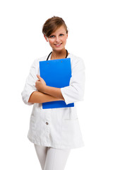 Successful young female doctor standing on white background