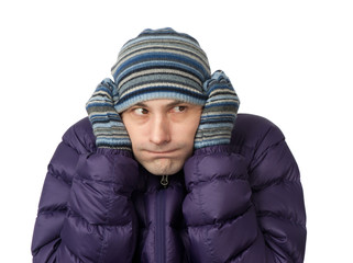 Close-up portrait of freezing young man