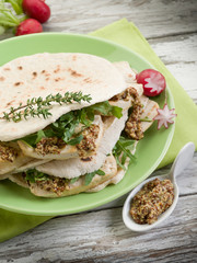 vegetarian sandwich, chapati with tofu arugula and mustard