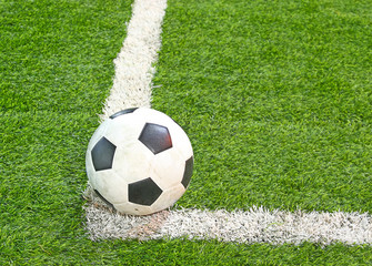 Fototapeta na wymiar football in soccer field