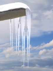 icicles from a roof gutter