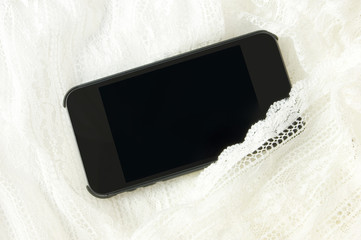 スマートホンとレース生地