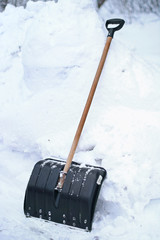 Shovel in a high snow - 37997532