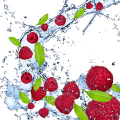 Fresh raspberries falling in water splash © Jag_cz