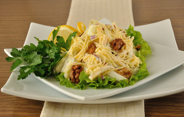Salad with cheese and apple, walnuts and yogurt