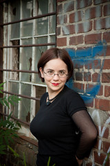 woman at an abandoned building with graffiti