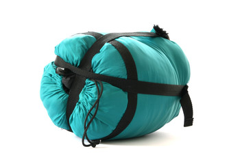 Packed sleeping-bag on white background
