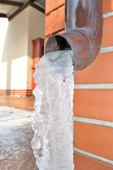 frozen water in the gutter