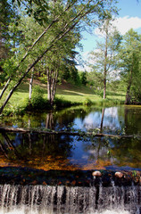 Fantastic stream and waterfall fragment in summer