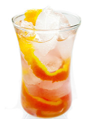 fruit cocktail drink with orange and ice