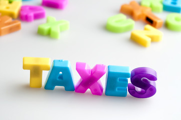 Fototapeta premium Taxes word