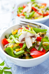 Rice salad with mushrooms and vegetables
