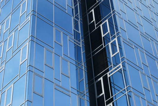 Modern office building middle blue glass floors