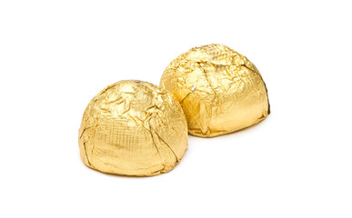 Chocolate pralines on white background