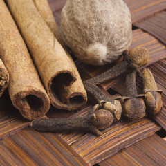 Cinnamon spice Sticks on wooden board close up