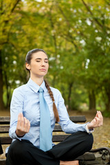 woman in suit doing yoga
