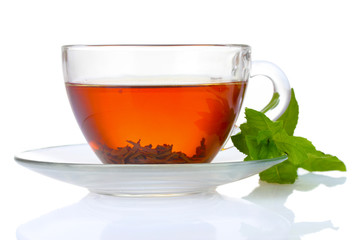 black tea  and mint in cup isolated on white