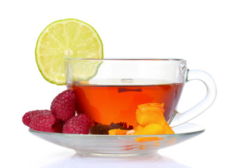 black tea in cup, lime, peach and raspberry isolated on white