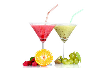 Delicious fruit smoothies and fruit isolated on white