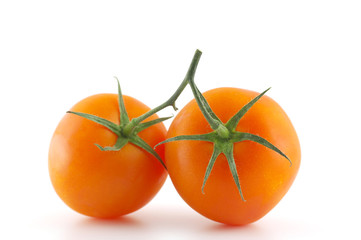Two red tomatoes