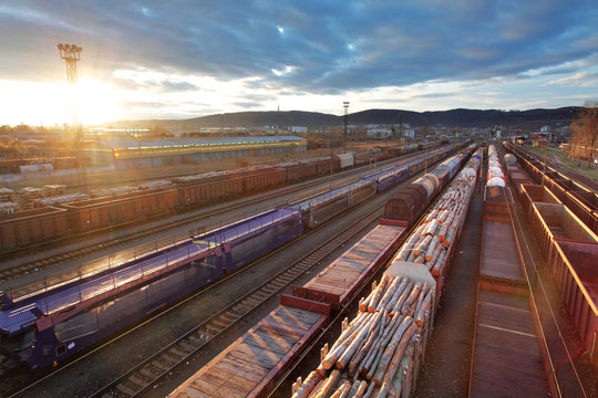 Freight Station with trains at sunset