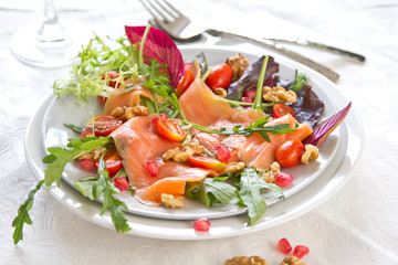 Smoked salmon with pomegranate and walnut salad