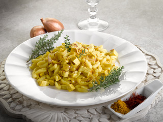 malloreddus pasta with mozzarella onions and saffron