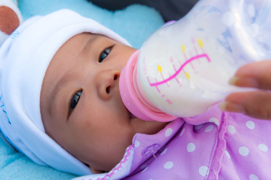 Thai Female Baby Eating Milk