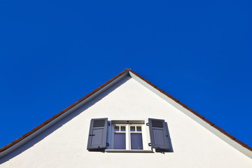 facade of house with blue sky