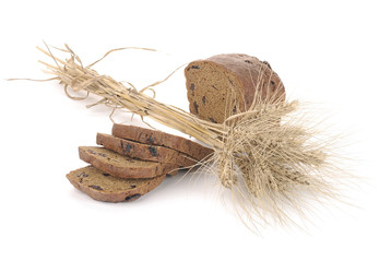 loaf of rye bread with spikelets isolated on white