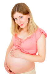 portrait of a beautiful pregnant woman tenderly holding her bell