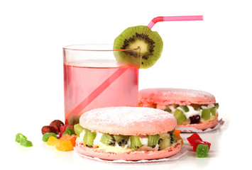 Two cakes and cocktail isolated on white