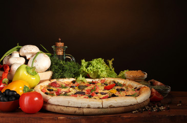 delicious pizza, vegetables and spices