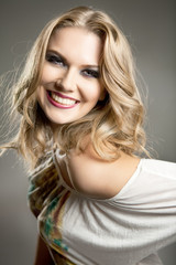 Naklejka premium smiling young beauty