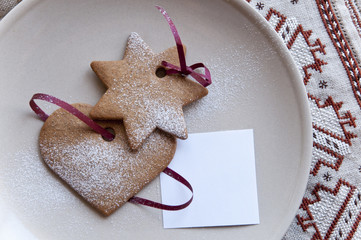 Hear and star cookies with paper note
